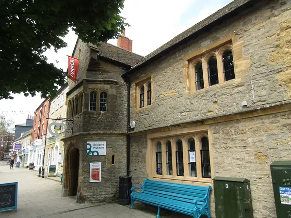 Stone front of Bridport Museum, a 16th-century building on South Street, Bridport